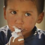 Boy eating ice cream